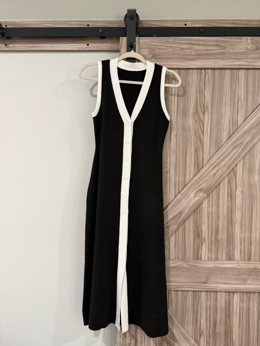 Sleeveless Black Knit Button-Front Dress with White Trim